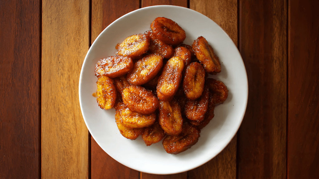 Top-view of Kerala Pazham Pori banana fry on a white plate