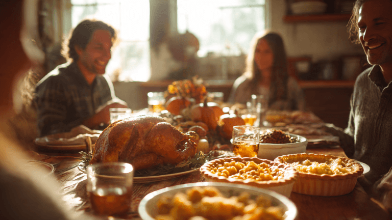 Beautiful Thanksgiving meal ideas featuring roast turkey, mashed potatoes, cranberry sauce, and pumpkin pie on a festive fall table.